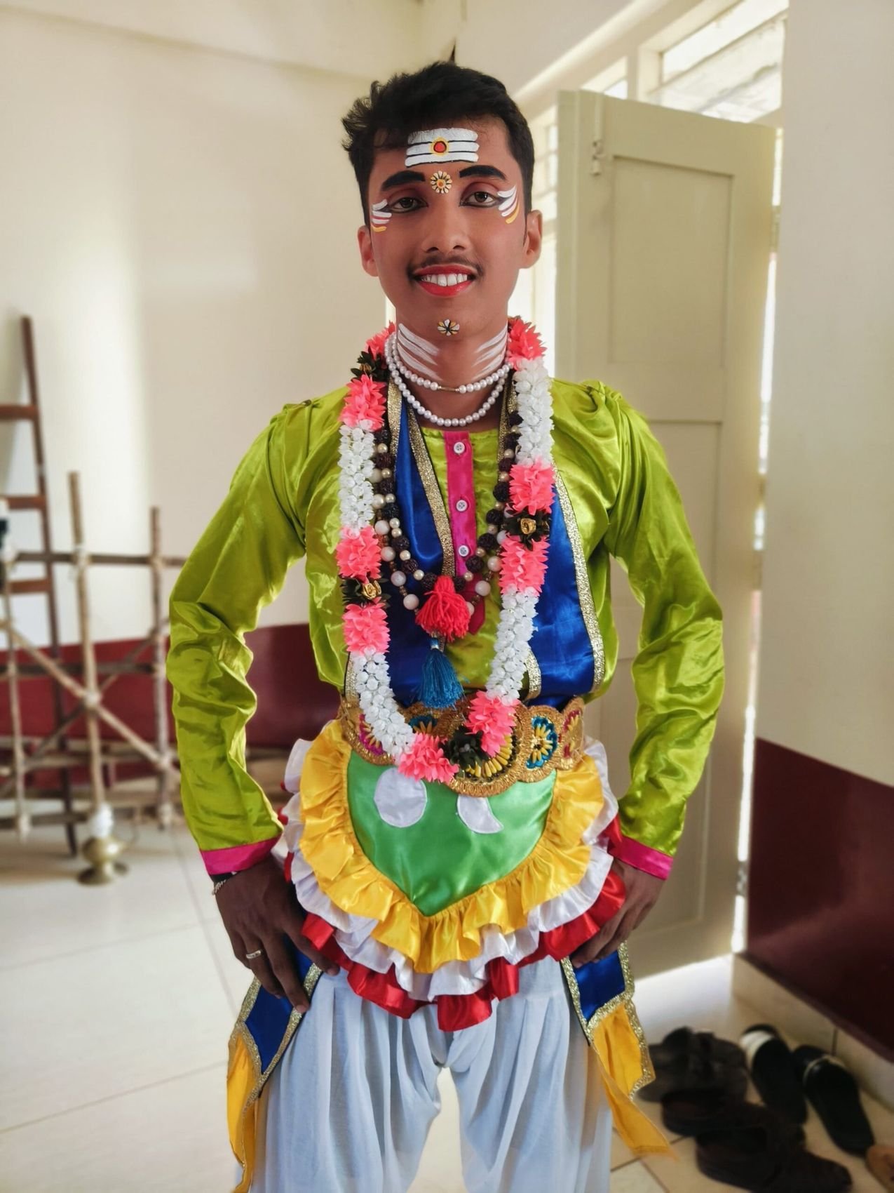 A student in traditional costume